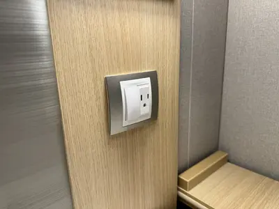 Harmony of the Seas cabin outlet by bed