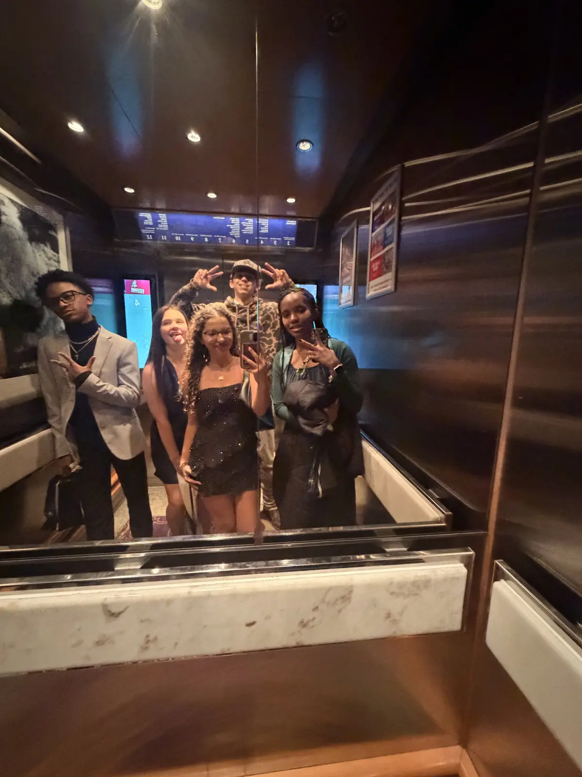 Teens in an elevator