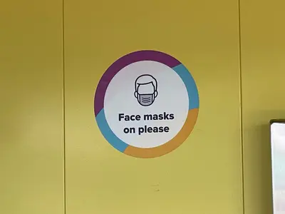Face masks on please sign