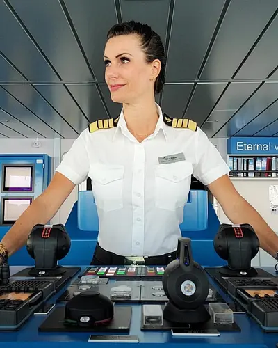 https://www.royalcaribbeanblog.com/sites/default/files/styles/mobile_1x/public/2023-06/captain-kate-helm.jpg.webp?itok=64fpTN1z