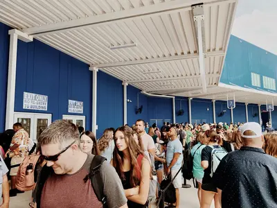 Line of people waiting to get inside the terminal in Galveston