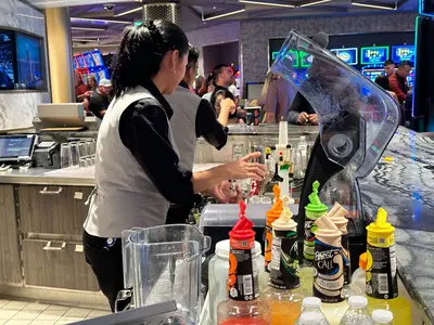 Pouring drink at the bar