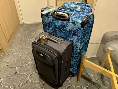 Suitcases in a cruise cabin