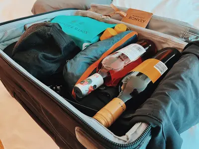 Can i pack drinks in my checked luggage on sale