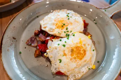 eggs on a bed of potatoes