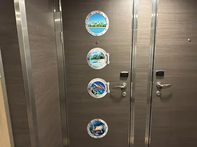 Porthole door decorations on Quantum of the Seas