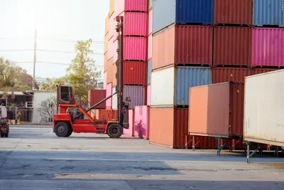 Forklift truck handling cargo