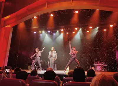 Adventure of the Seas show in the theater