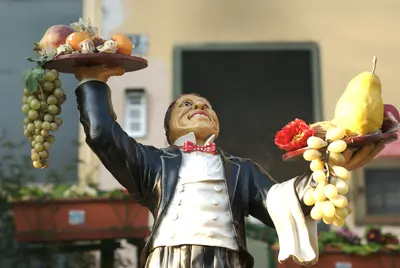 Waiter statue