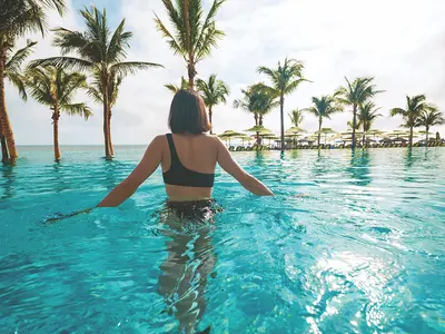 Woman in infinity pool