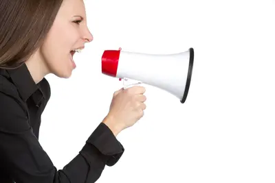 woman holding bullhorn