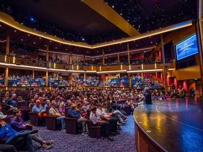 Michael Bayley speaking at President's Cruise