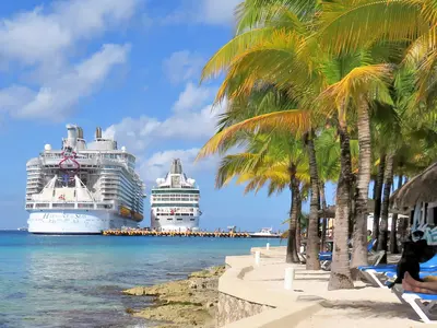 https://www.royalcaribbeanblog.com/sites/default/files/styles/mobile_1x/public/fb/royal-caribbean-ships-docked-cozumel.jpg.webp?itok=Ht7iQS-b