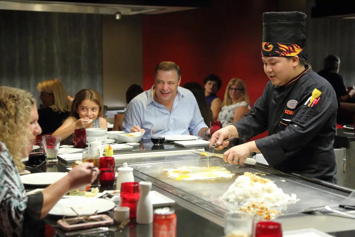 Family enjoying a Hibachi style dinner