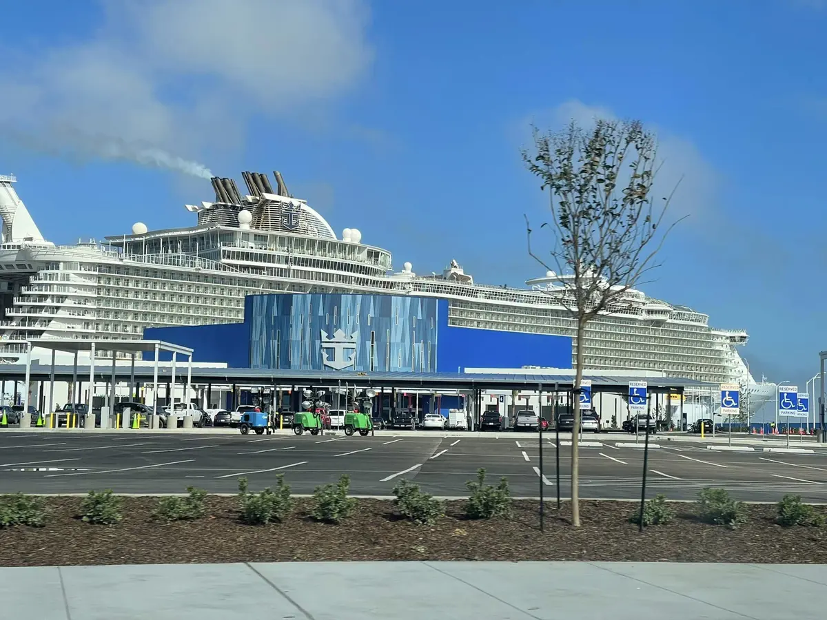 Galveston cruise terminal with Allure of the Seas behind it
