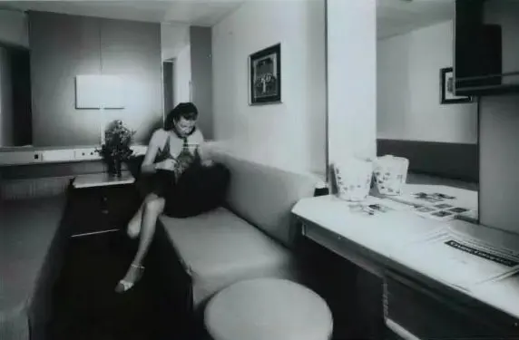 Woman in an inside cabin