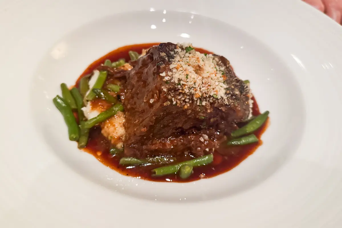 Plate of steak in the Main Dining Room on Carnival Firenze