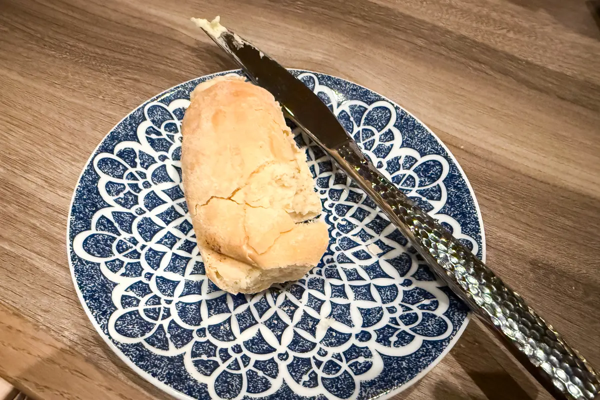 one bread roll on a plate