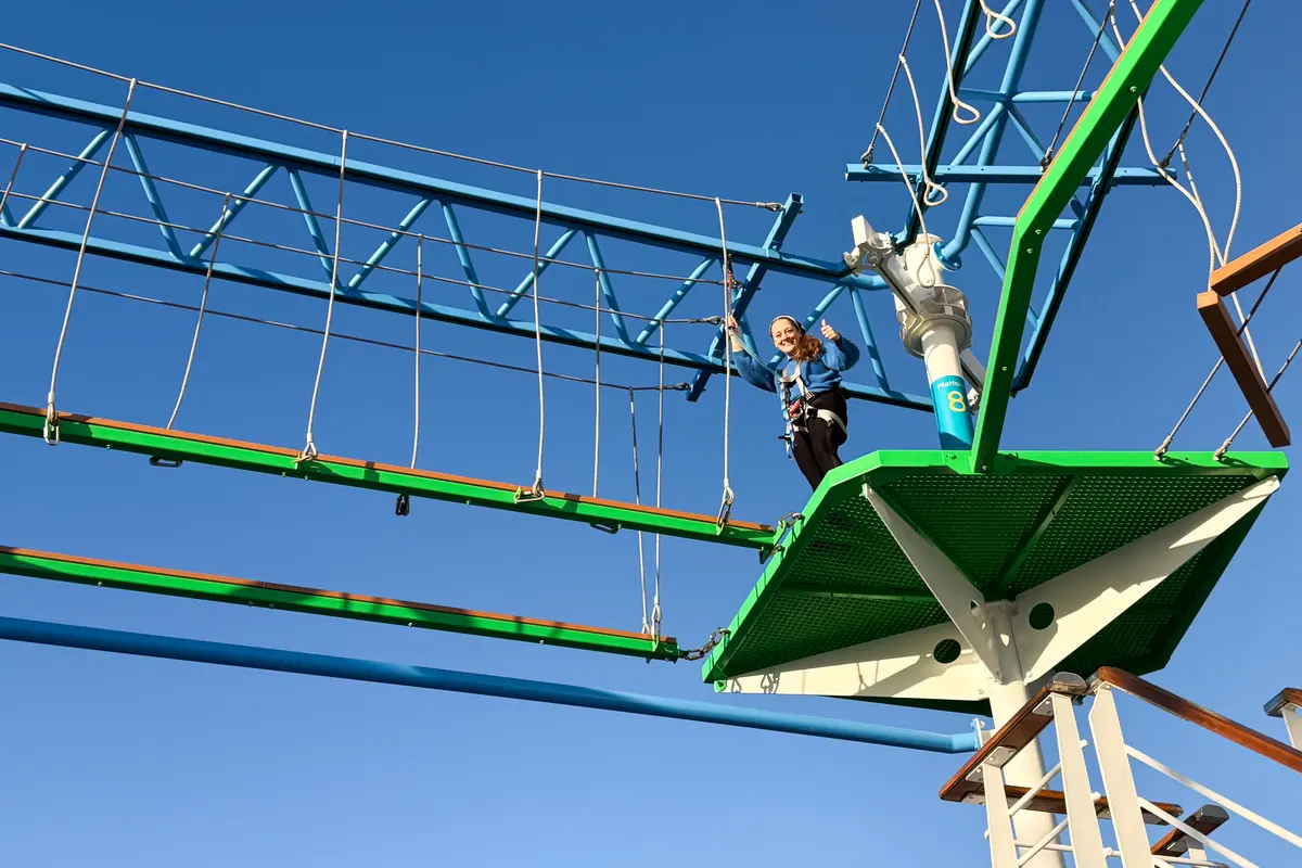 Jenna on the ropes course on Carnival Firenze cruise ship