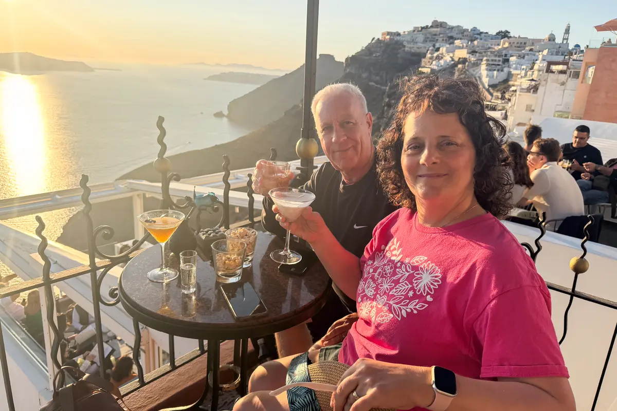 my parents enjoying cocktails in Santorini