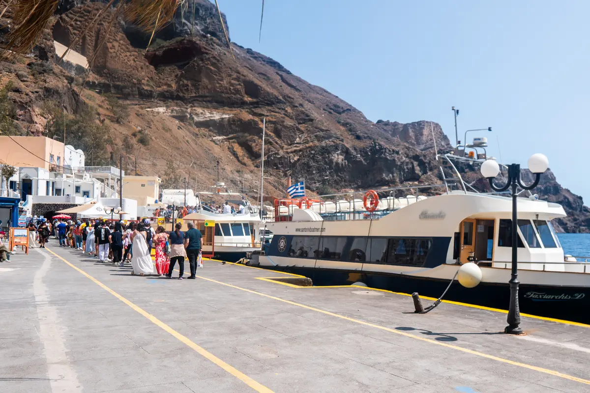 waiting for a tender boat in Santorini