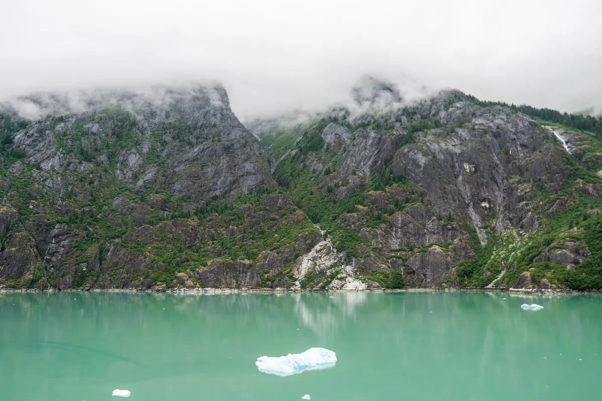 mountain scenery in Alaska with an iceberg