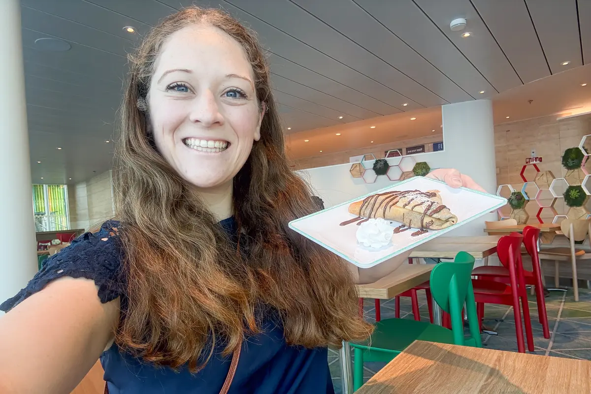 Jenna taking a selfie with a crepe