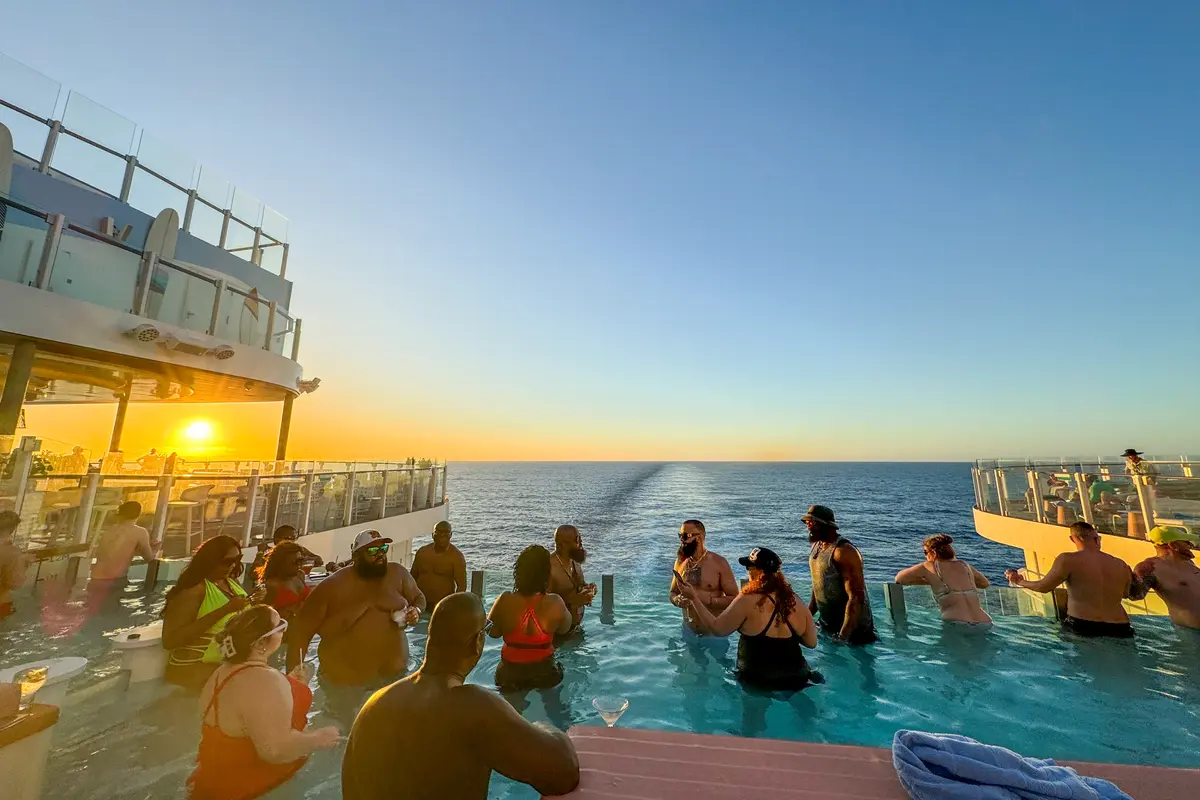 sunset from The Hideaway pool on Icon of the Seas