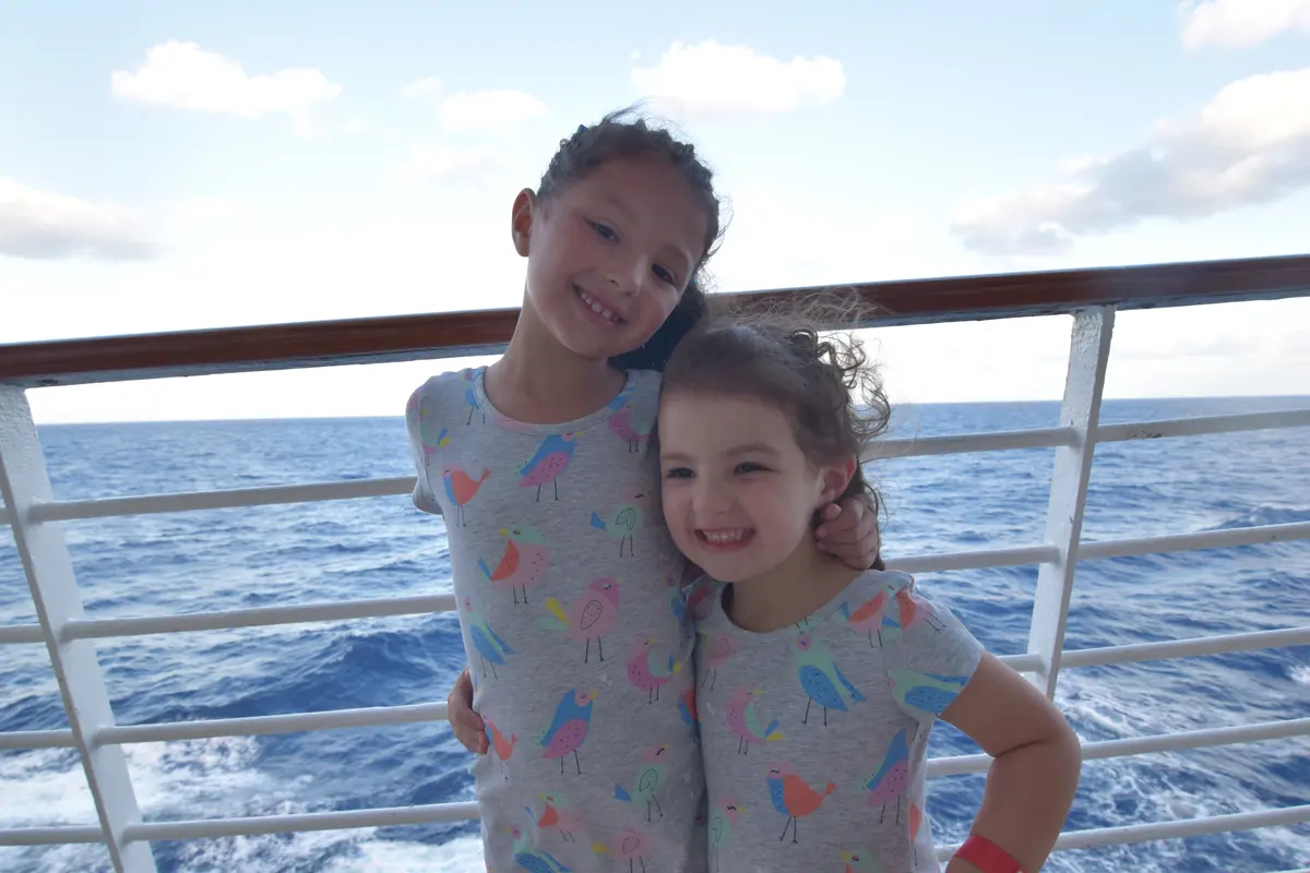 Kids in front of balcony