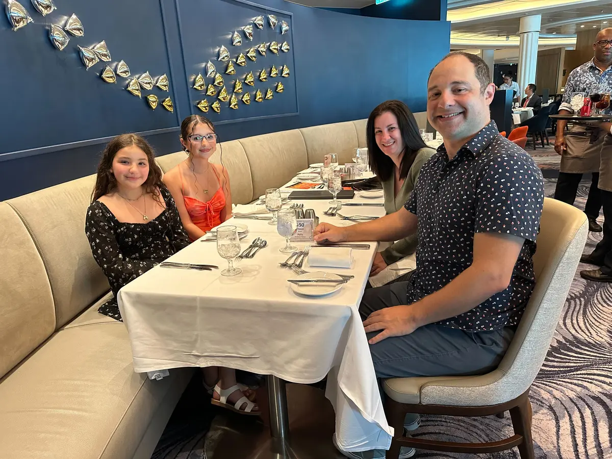 Matt and his family at thanksgiving on a ship