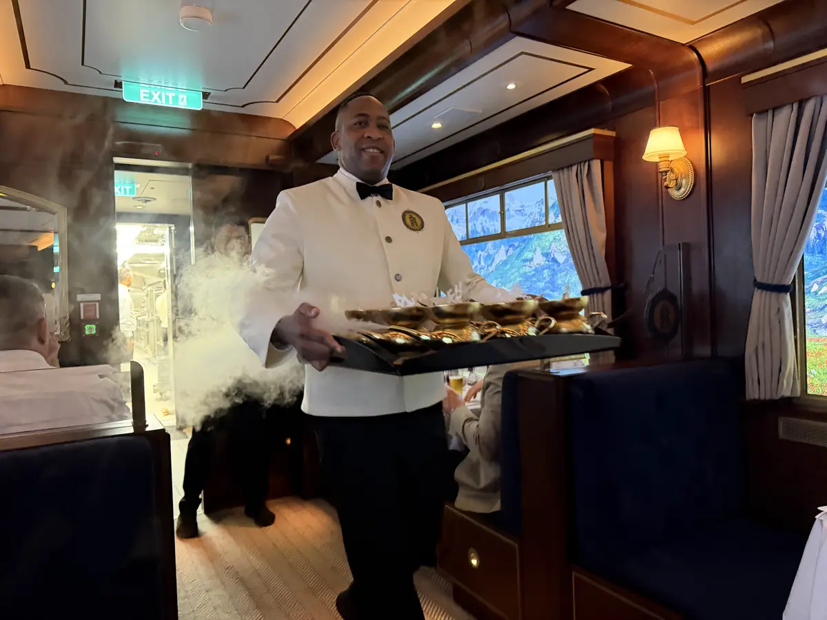 Waiter bringing food
