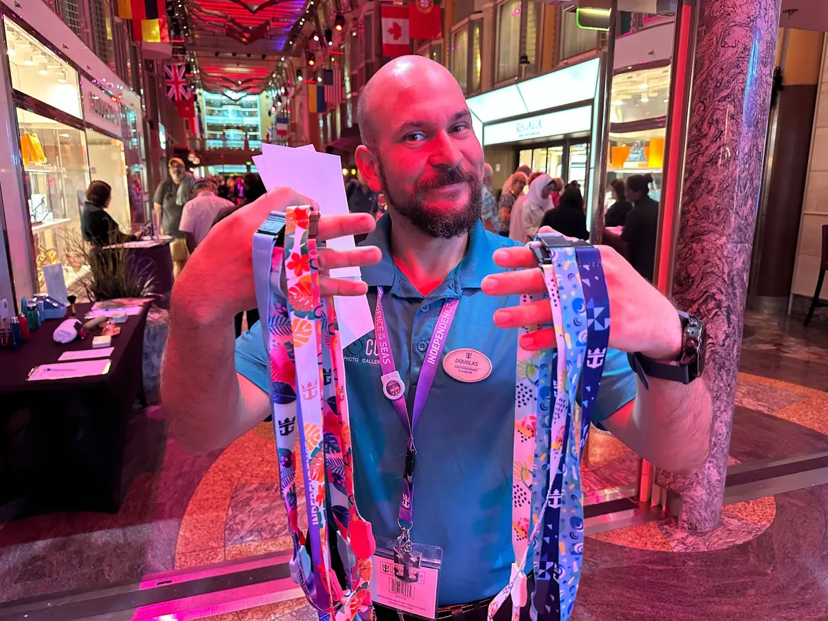 Crew member selling lanyards