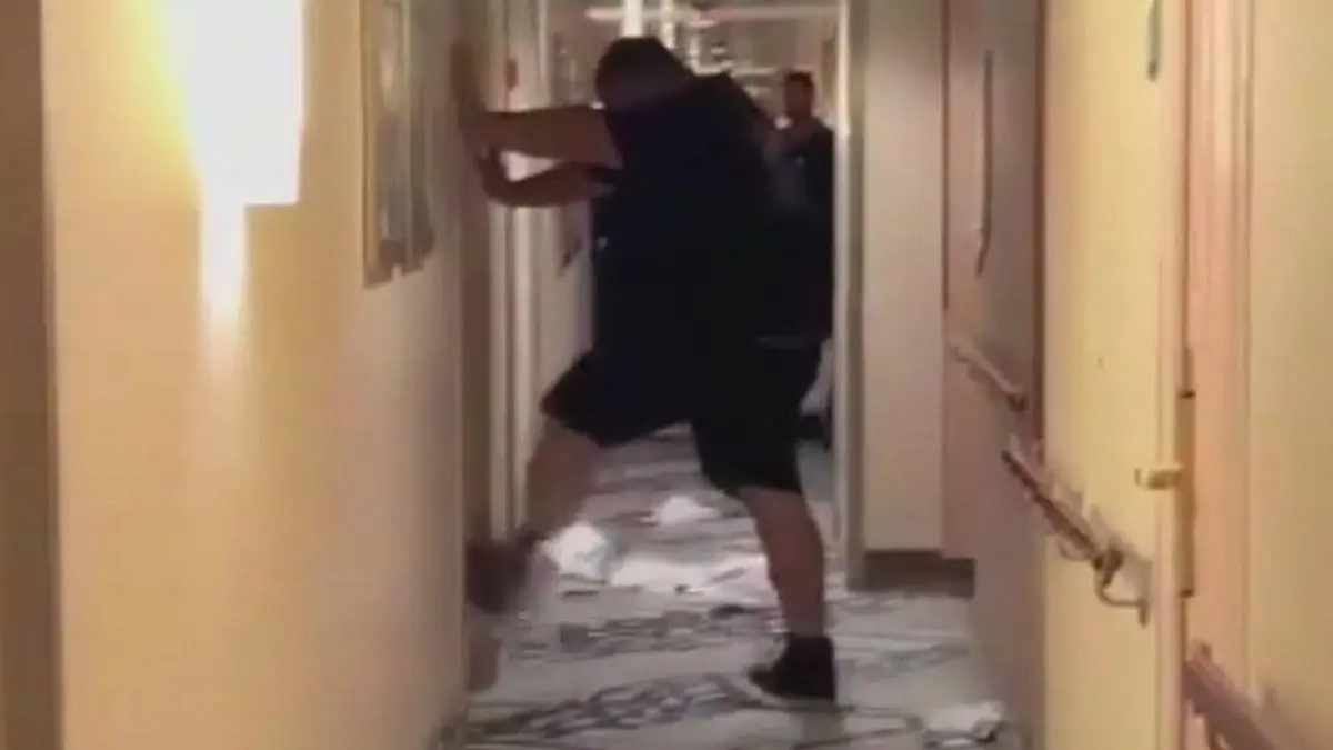 Man kicking door