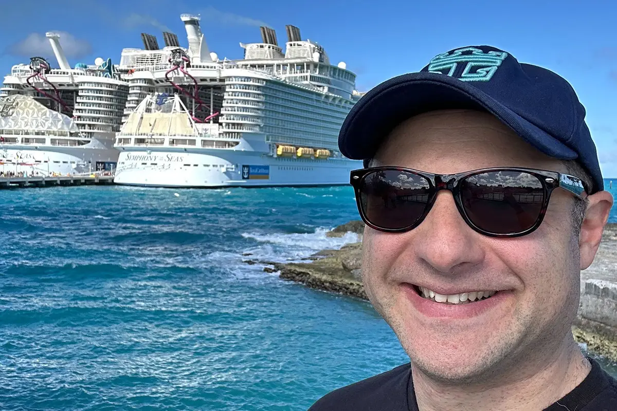 Matt in front of two ships