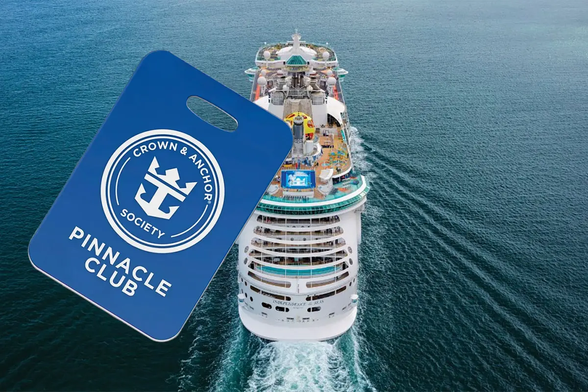 Pinnacle Club logo next to cruise ship