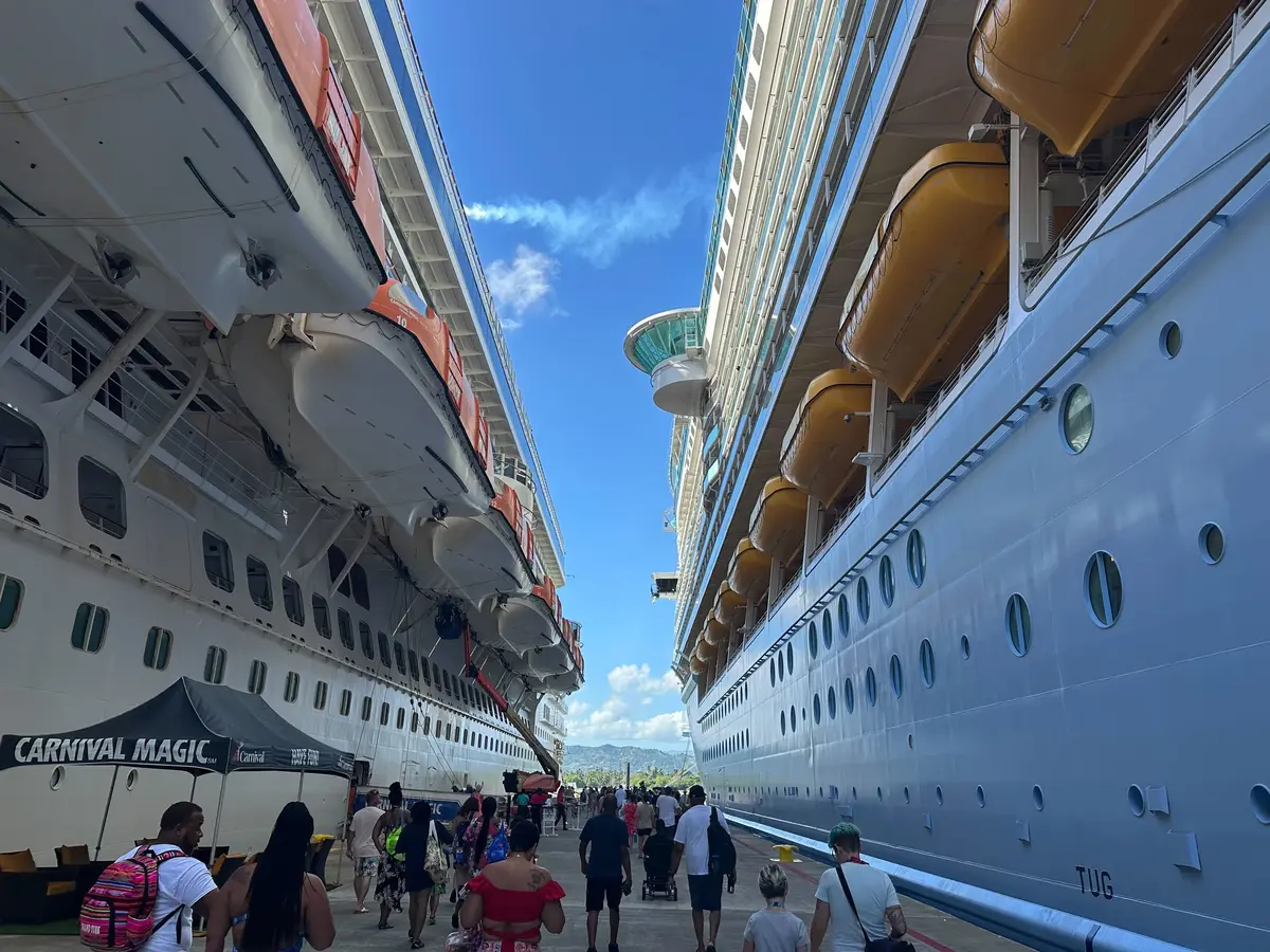 Carnival ship left, Royal Caribbean ship right