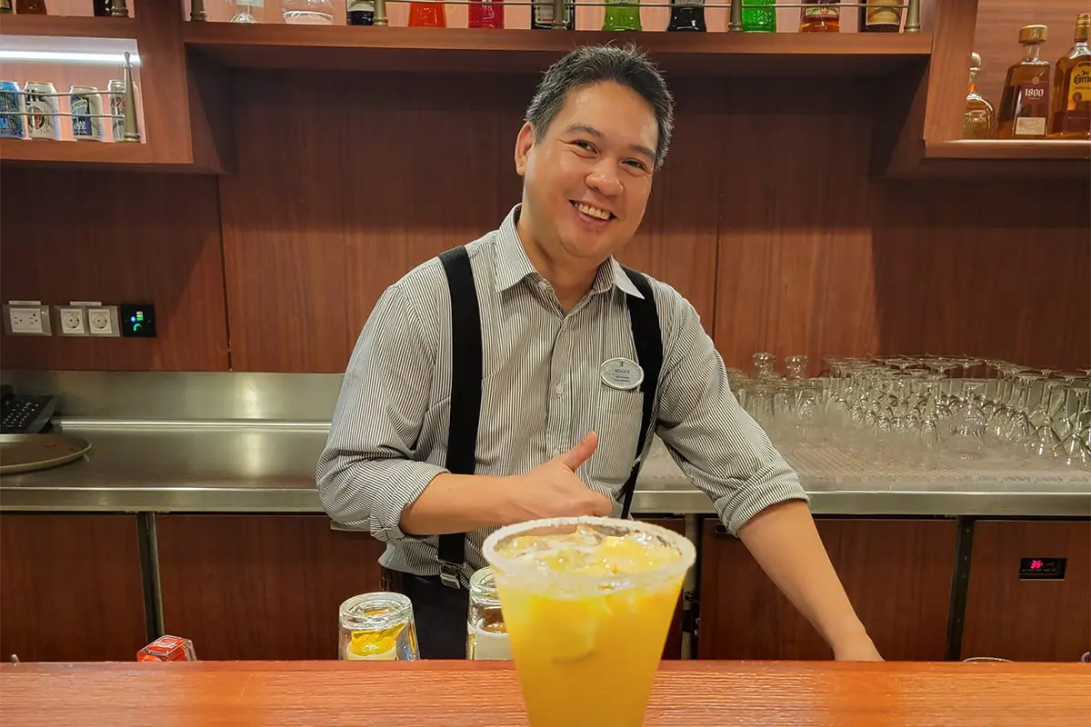 Bartender behind the bar